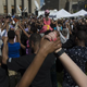 People pray during a rally in front of City Hall in Baltimore May 3, 2015, calling for peace following widespread unrest stemming from protests over the death of Freddie Gray, 25, who suffered a serious spinal injury while in the back of a police van April 12, 2015.
NICHOLAS KAMM/AFP/Getty Images